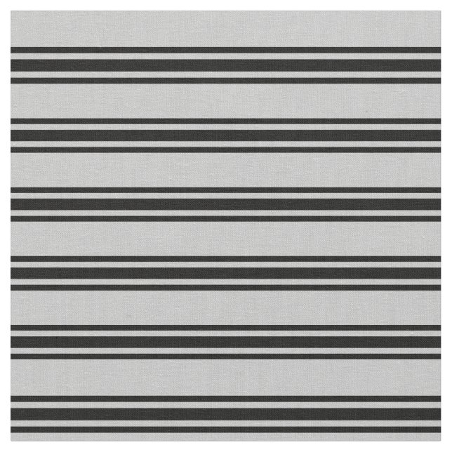Graues und schwarz gefärbtes Streifenmuster Stoff (Nahaufnahme)