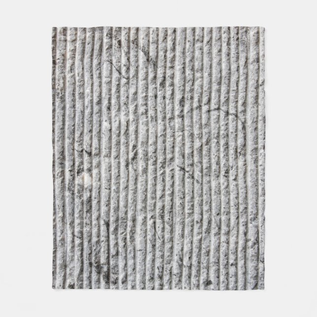 Grausteinfarbene Wandstruktur. Textur der Steinmau Fleecedecke (Vorderseite)
