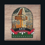 Graz Steiermark Souvenir Küchen Magnet<br><div class="desc">Erleben Sie das Flair von Graz in KüchenŌ mit dem Ausschließlichen weiten Magneten. Das Design in den Farben Schwarz, Grün und Rot zeigt eine noch unumstößliche Illustration der Stadt Graz und den Schriftzug "Graz" auf einem schwarzen Banner mit Vintagem . Der im Holzschreibtisch und dem Magnet. Sie mit diesem Akzent...</div>