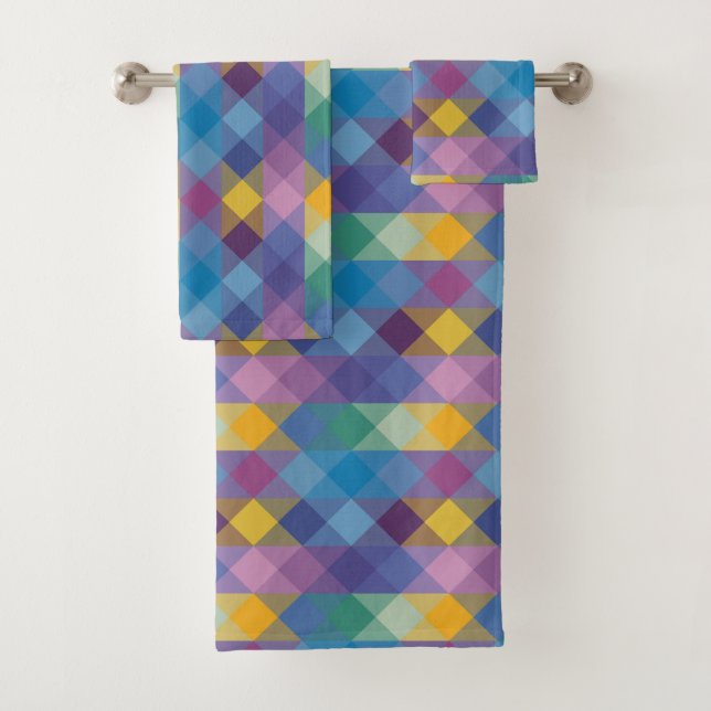 green, blue, pink, yellow and purple geometric badhandtuch set (Insitu)