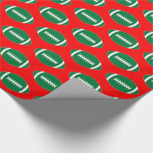 Green Footballs auf Red Background Weihnachtsgesch Geschenkpapier