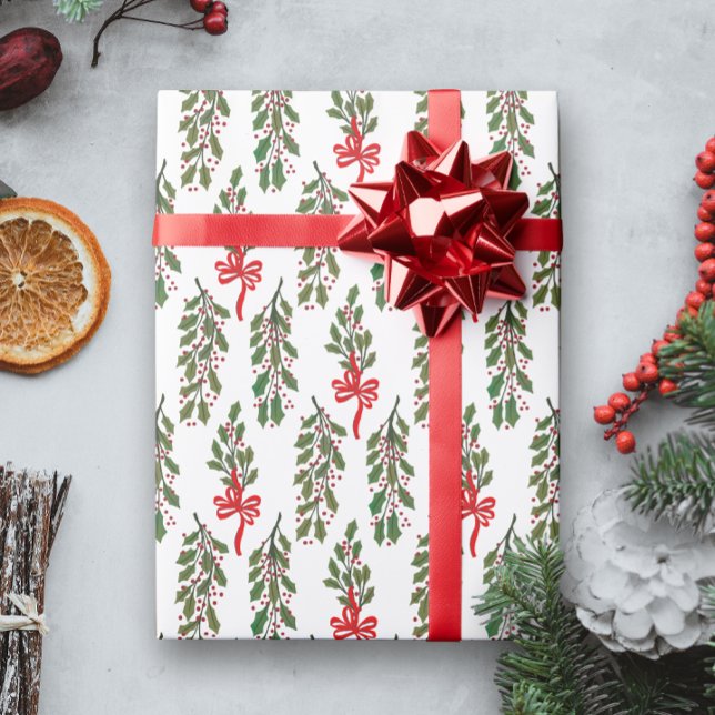 Green Holland mit Red Bows Weihnachten Geschenkpapier (Christmas holiday gift wrapping paper with a pattern of green holly sprigs and red looping bows)