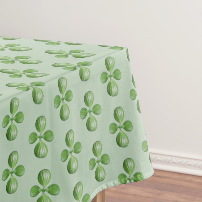 Green Jade Tree Blätter auf hellgrün Tischdecke (Beispiel)