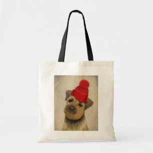 Grenze Terrier mit Rot Bobble Hut Tragetasche