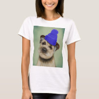 Grenzer Terrier mit blauem Bobble Hat