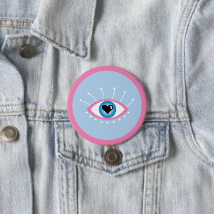 Griechisches böse Auge mit Augenlider rosa Blau Button