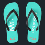 Groom Mr. Turquoise Blue Flip Flops<br><div class="desc">Hell türkis blau mit Mr. und Nachname geschrieben in weißem Text und Datum der Hochzeit in Korallen zu personalisieren mit schwarzen Akzenten. Strand Ziel oder Flitterwochen Flip Flops für den neuen Bräutigam. Originale Entwürfe von TamiraZDesign.</div>