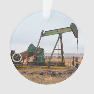 Große grüne Pumpjack auf dem Ölfeld Ornament