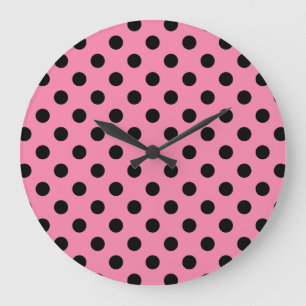 Große schwarze Polka Punkte auf heißen rosa Wanduhr