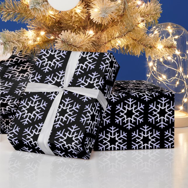Große Silberschneeflocken auf schwarz Geschenkpapier (Feiertage)