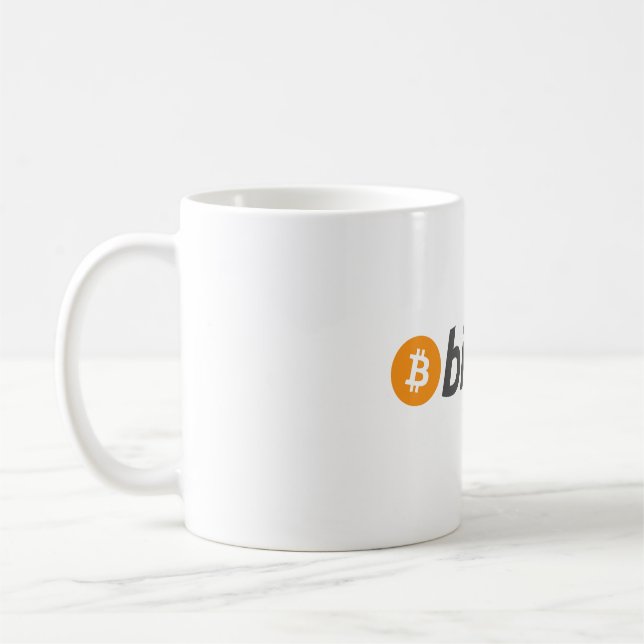 Grosses Bitcoin-Logo mit orangefarbenem Bitcoin-Sy Kaffeetasse (Links)