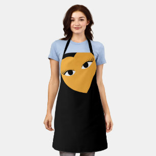 Grosses Herz mit Augen auf schwarzer Schürze