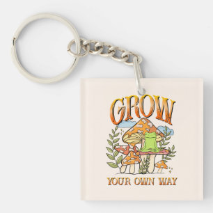 "Grow your own way" Frosch und Pilze vermitteln Schlüsselanhänger