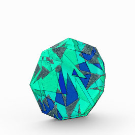 Grüne dreieckige Ausschnitte auf blauem Hintergrun Fotoblock