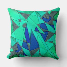 Grüne Dreiecksausschnitte mit rauen blauen Stücken Kissen