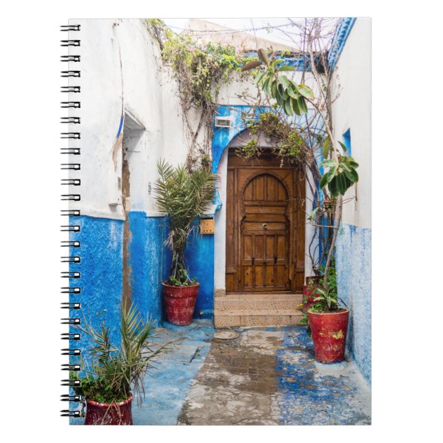 GRÜNE GEÖFFNETE PFLANZE NAHE WALL NOTIZBLOCK (Vorderseite)