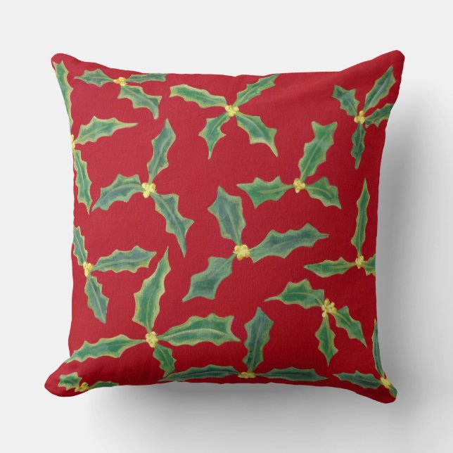 Grüne Holly-Blätter, gelbe Blumen auf roten Kissen (Vorderseite)