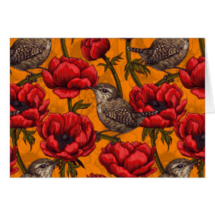 Grüne in einem roten Anemonengarten