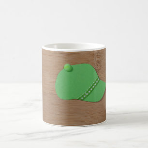 Grüne Kappe auf einem Bambusholz Tasse