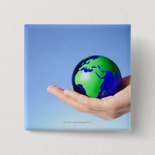 Grüne Kugel in der Hand Button