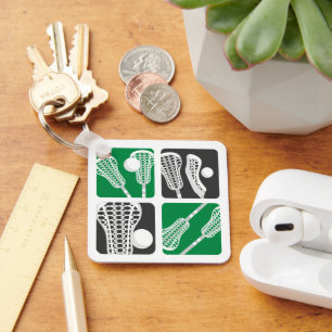 Grüne Lacrosse Blöcke von Sticks und Balls Schlüsselanhänger