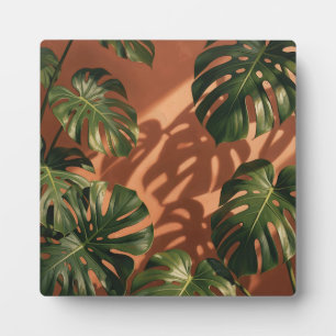 Grüne Monstera-Blätter Terrakotta-Schatten Fotoplatte