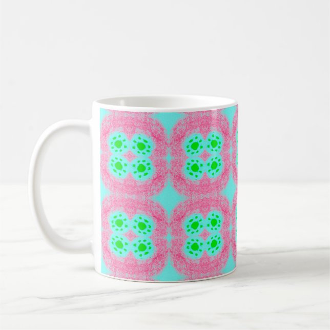 Grüne Pastellabdeckung, tribaler Ikat-Druck. Moder Kaffeetasse (Links)