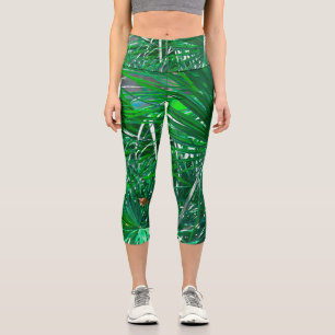 Grüne Pflanze aus Palmen Blätter pastellfarben Capri Leggings