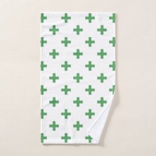 Grüne Polka kreuzt auf Weiß Handtuch
