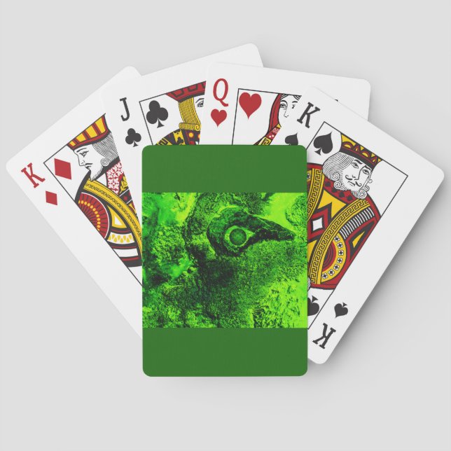 grüne Spielkarten suchend (Rückseite)