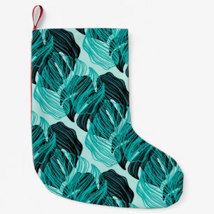Grüne tropische Palmen Blätter Design. Kleiner Weihnachtsstrumpf