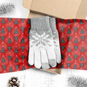 Grüne Weihnachtsbäume auf rotem Wirbel Seidenpapier