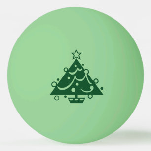 Grüne Weihnachtsbaumgestalt auf Dunkelheit Tischtennisball