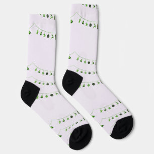 Grüne Weihnachtsschmuck auf Socken