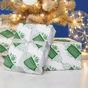 Grüne Wirbel legen das Umschlagpapier vor Geschenkpapier