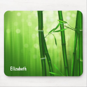 Grüner Bambus mit blassfarbenen Bokeh-Lichtern hin Mousepad