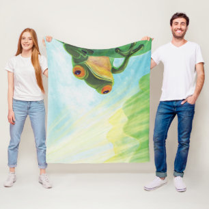 Grüner Frosch, der Sonnenstrahlen fängt Fleecedecke