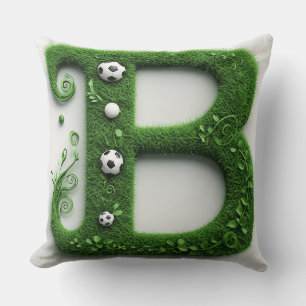 Grüner Gras-Buchstabe-B-Topiarie mit Fußball Kissen