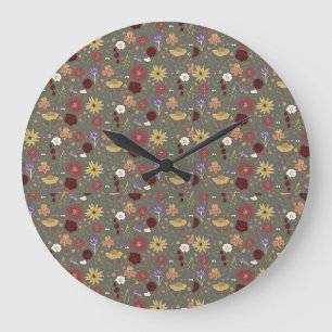 Grüner Hintergrund für die Blumenpracht im Herbst Große Wanduhr