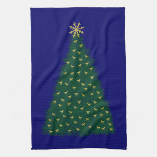 Grüner Weihnachtsbaum, goldene Laufpferde auf der Geschirrtuch