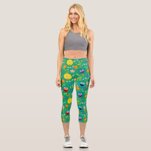 Grünes Blumenmuster in der Sesamstraße Capri Leggings