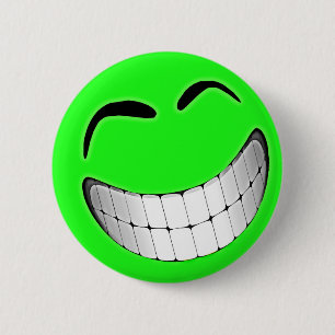 Grünes großes Grinsen-Gesicht Button
