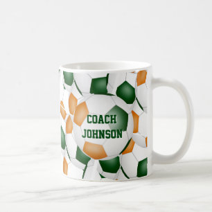 grünes orangefarbenes Fußball-Schulteam-Trainer-Ge Kaffeetasse