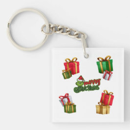 Grünes Weihnachtsgeschöpf mit Geschenkschachteln Schlüsselanhänger
