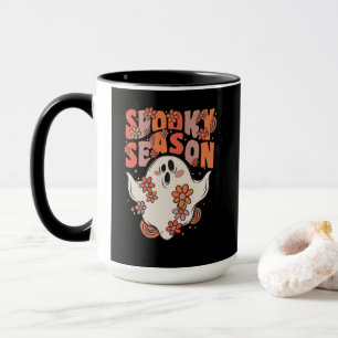 Gruselige Jahreszeit Groovy Geist mit Vintage-Blum Tasse