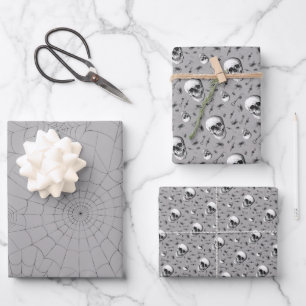 Gruselige Spinnennetze und Totenkopf Halloween Geschenkpapier Set