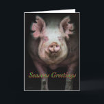 Gruß Feiertagskarte<br><div class="desc">Ein Schwein,  das aus einer dunklen Scheune kommt,  mit "Frohen Festtagen" unter seinem Gesicht geschrieben</div>