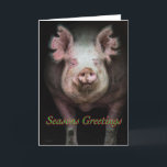 Gruß Feiertagskarte<br><div class="desc">Ein Schwein,  das aus einer dunklen Scheune kommt,  mit "Frohen Festtagen" unter seinem Gesicht geschrieben</div>