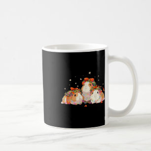 Guinea Schweine in der Guinea Weihnachtslicht vers Kaffeetasse