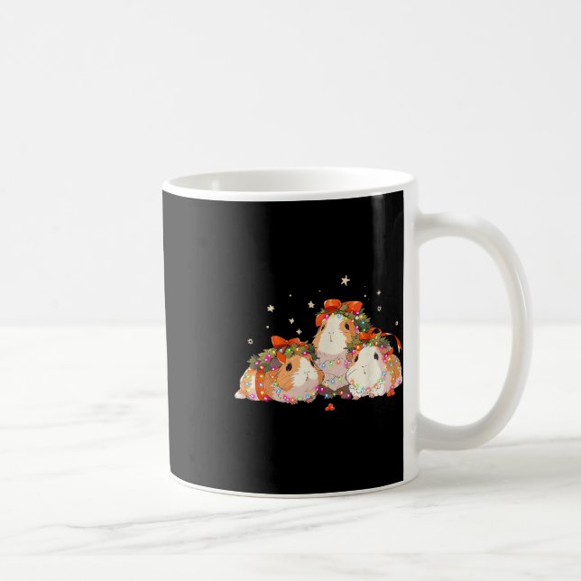 Guinea Schweine in der Guinea Weihnachtslicht vers Kaffeetasse (Rechts)